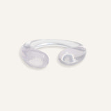Clear open cuff bracelet with rounded ends, minimal resin design.