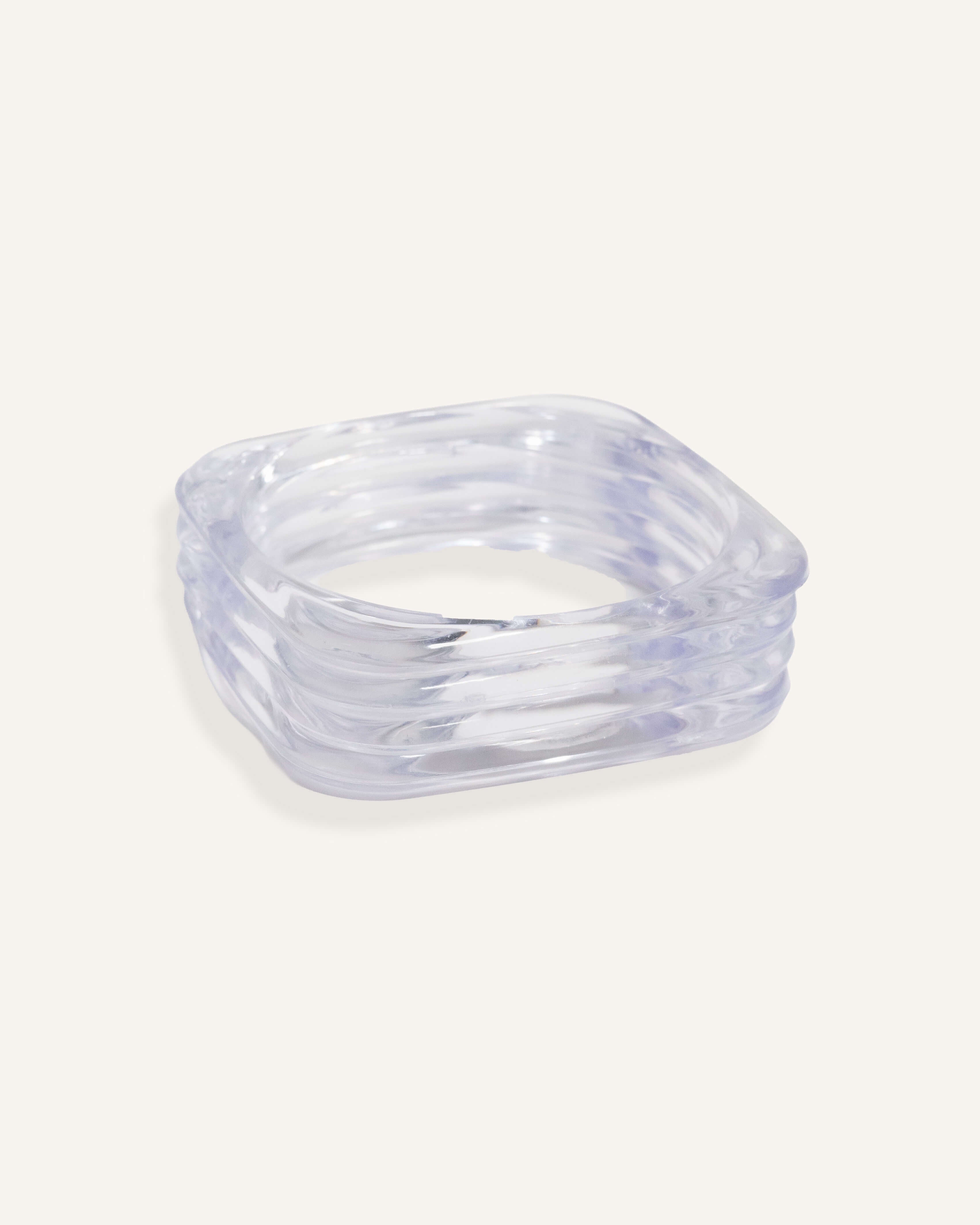 Clear resin square bracelet with curved edges, shown stacked and solo