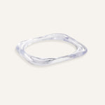 Clear resin square bracelet with curved edges, shown stacked and solo.