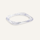 Clear resin square bracelet with curved edges, shown stacked and solo.