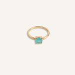 14K gold stone ring with a turquoise crystal centerpiece