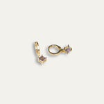 Clara earrings with gold hoop earring set and small dangle earrings, a timeless and chic accessory.