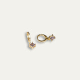 Clara earrings with gold hoop earring set and small dangle earrings, a timeless and chic accessory.