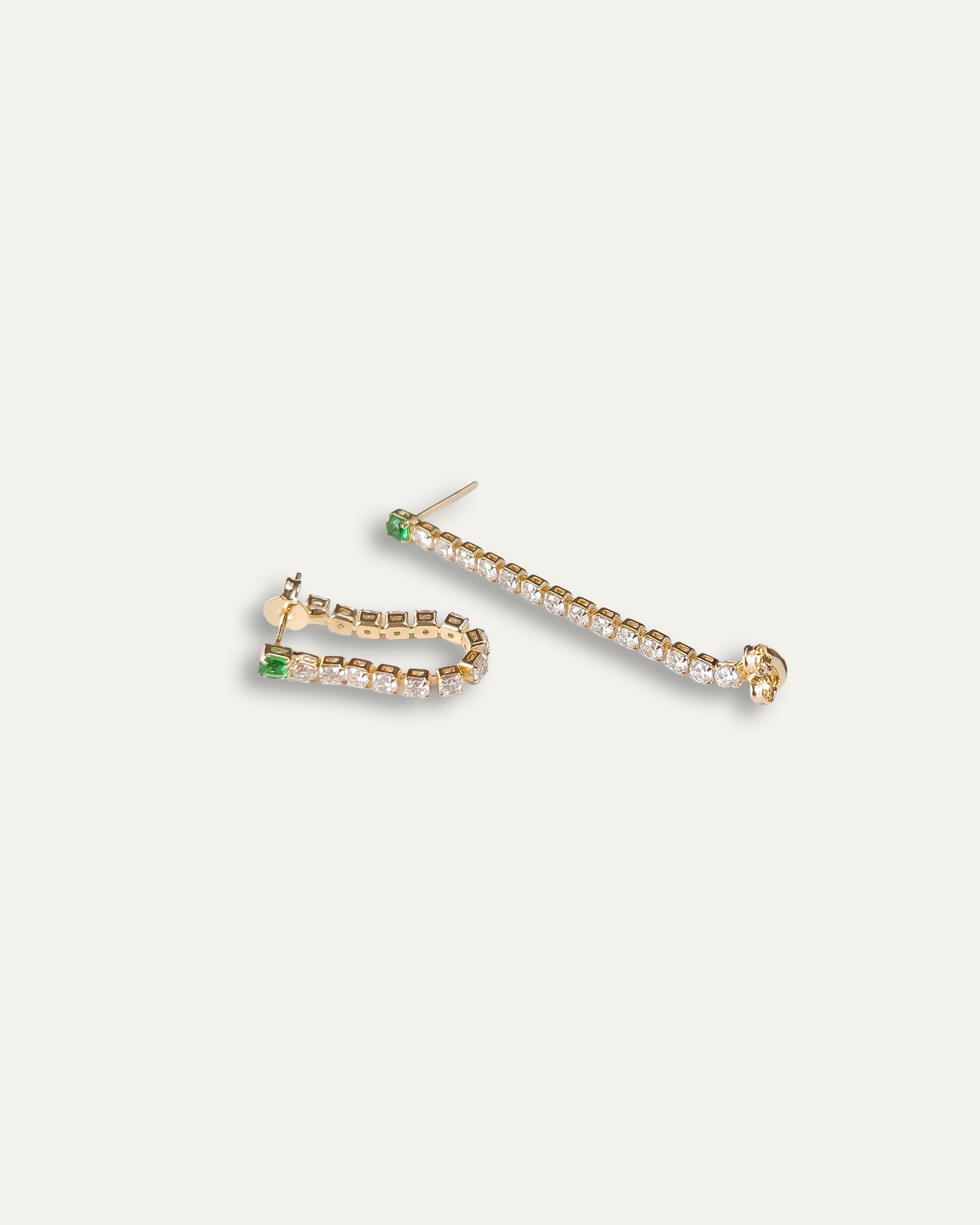 Stella earrings with gold hoop earring set and small dangle earrings, a timeless and chic accessory.