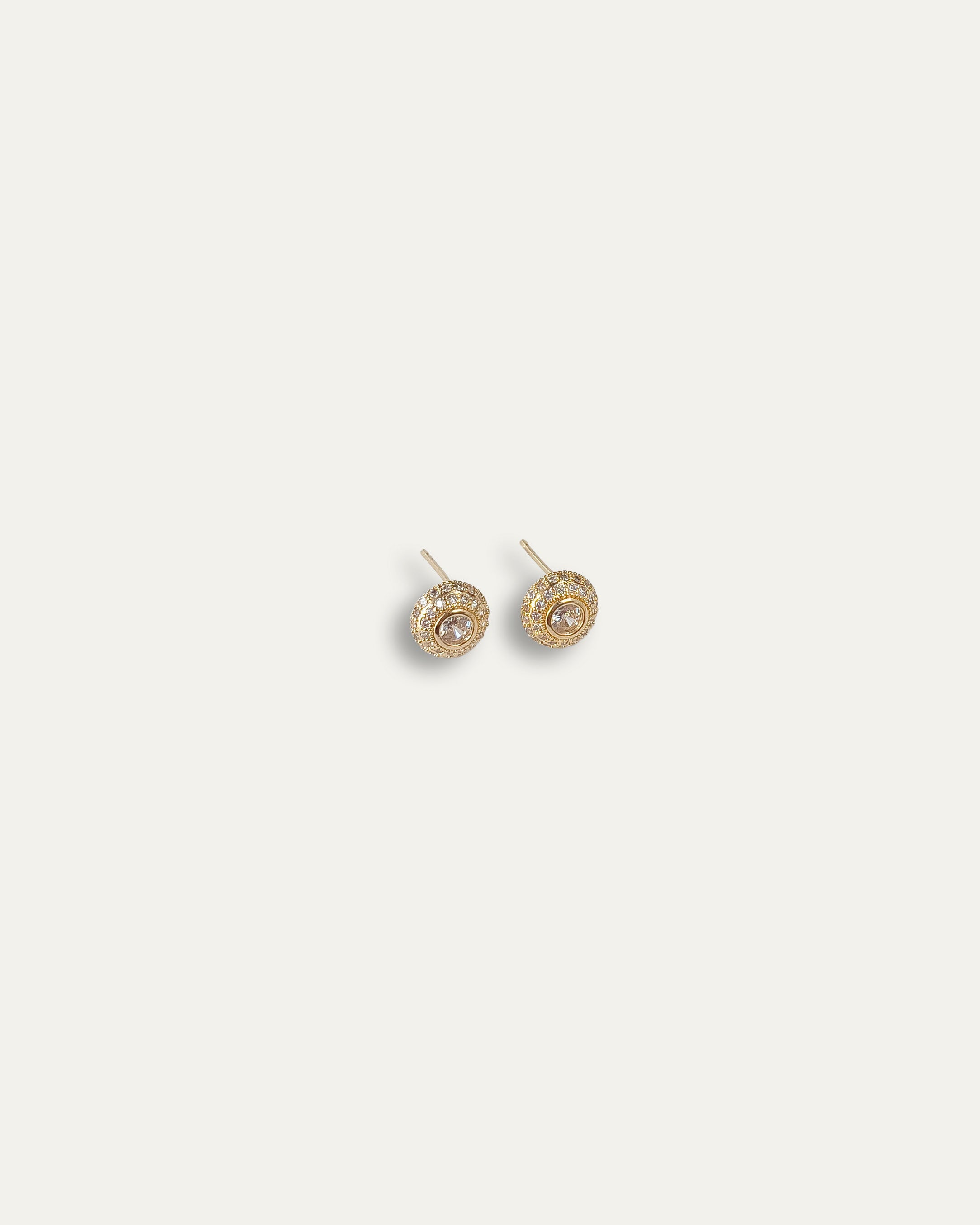 Emma earrings with gold hoop earring set and small dangle earrings, a timeless and chic accessory.