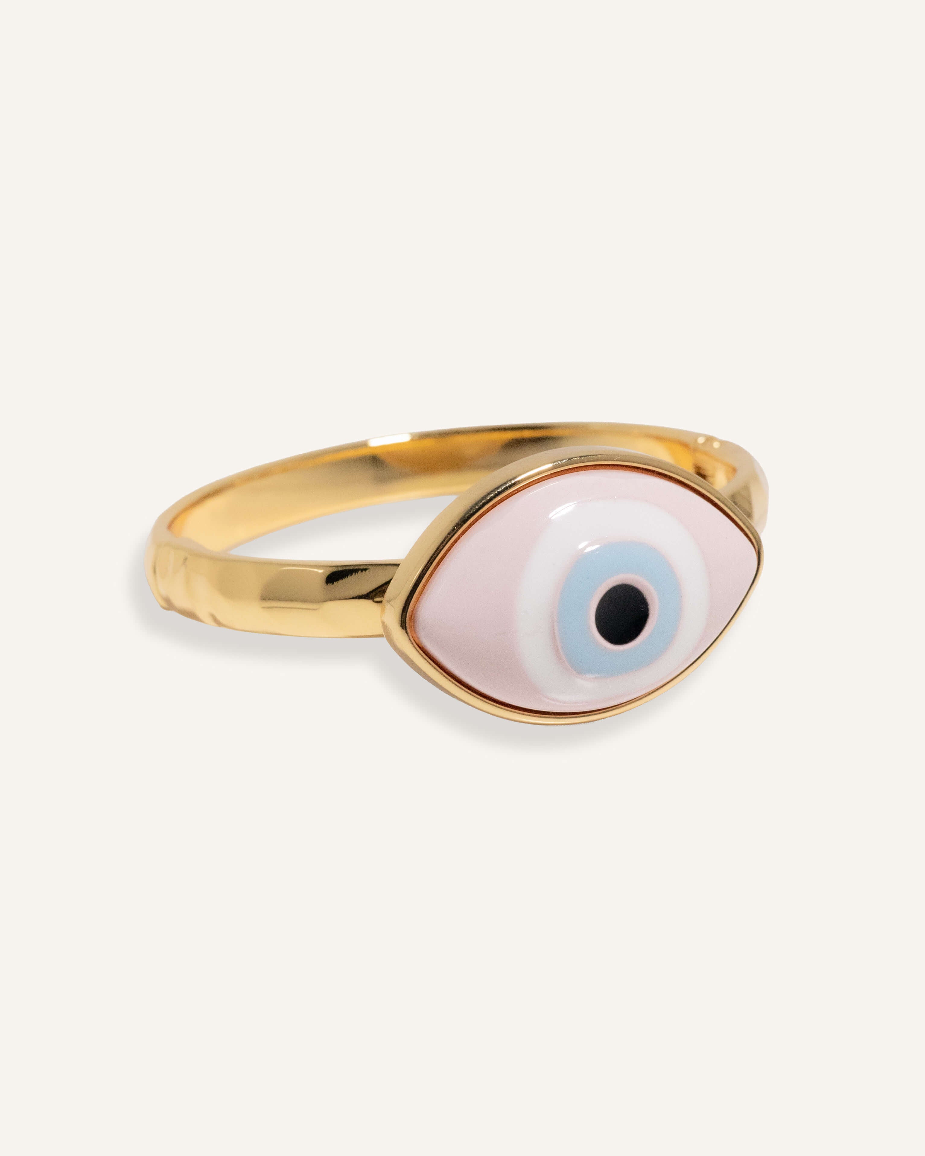 Gold evil eye bracelet with 3D enamel charm on fixed-size chain, styled for women..