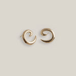 Gold plated spiral earrings with sculptural curved design, shown front facing
