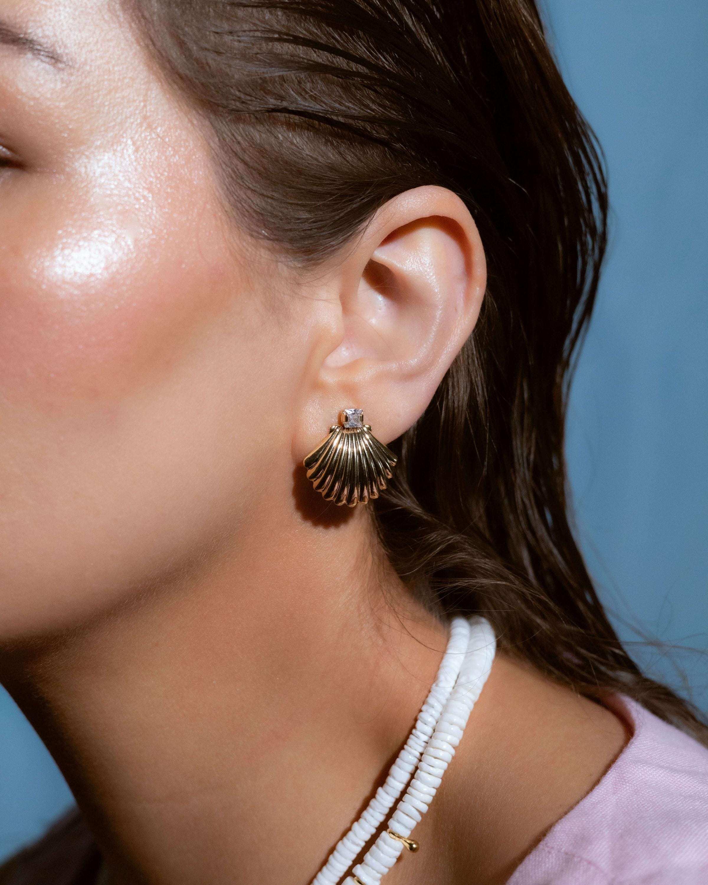 Gold plated shell drop earrings with cubic zirconia studs, coastal beach-themed summer jewelry for women