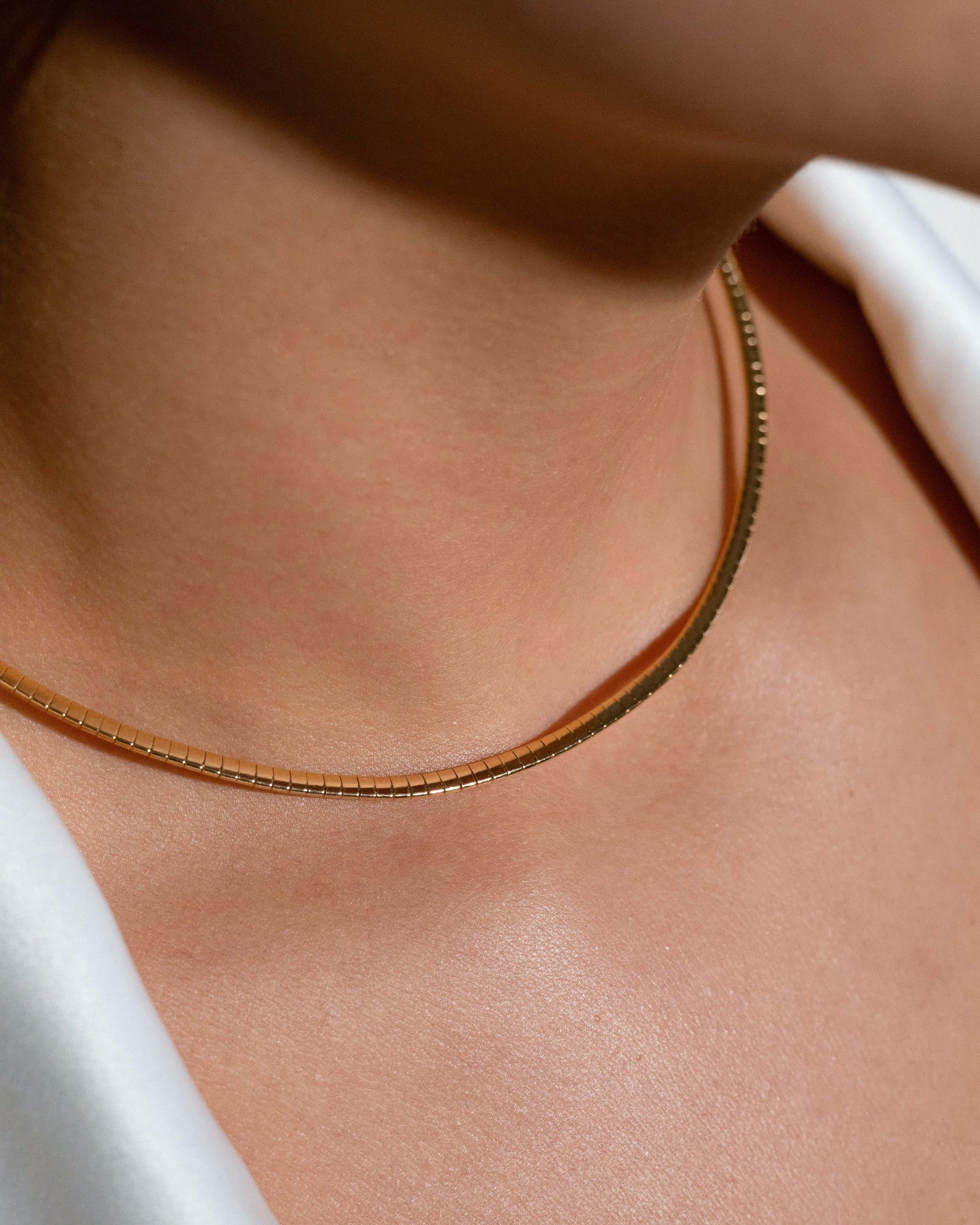 Gold plated flat snake chain necklace, sleek collar choker with polished finish, elegant layering piece, trendy minimalist gift for her