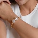gold plated double pearl bracelet with two white pearls, modern minimalist bangle jewelry for women