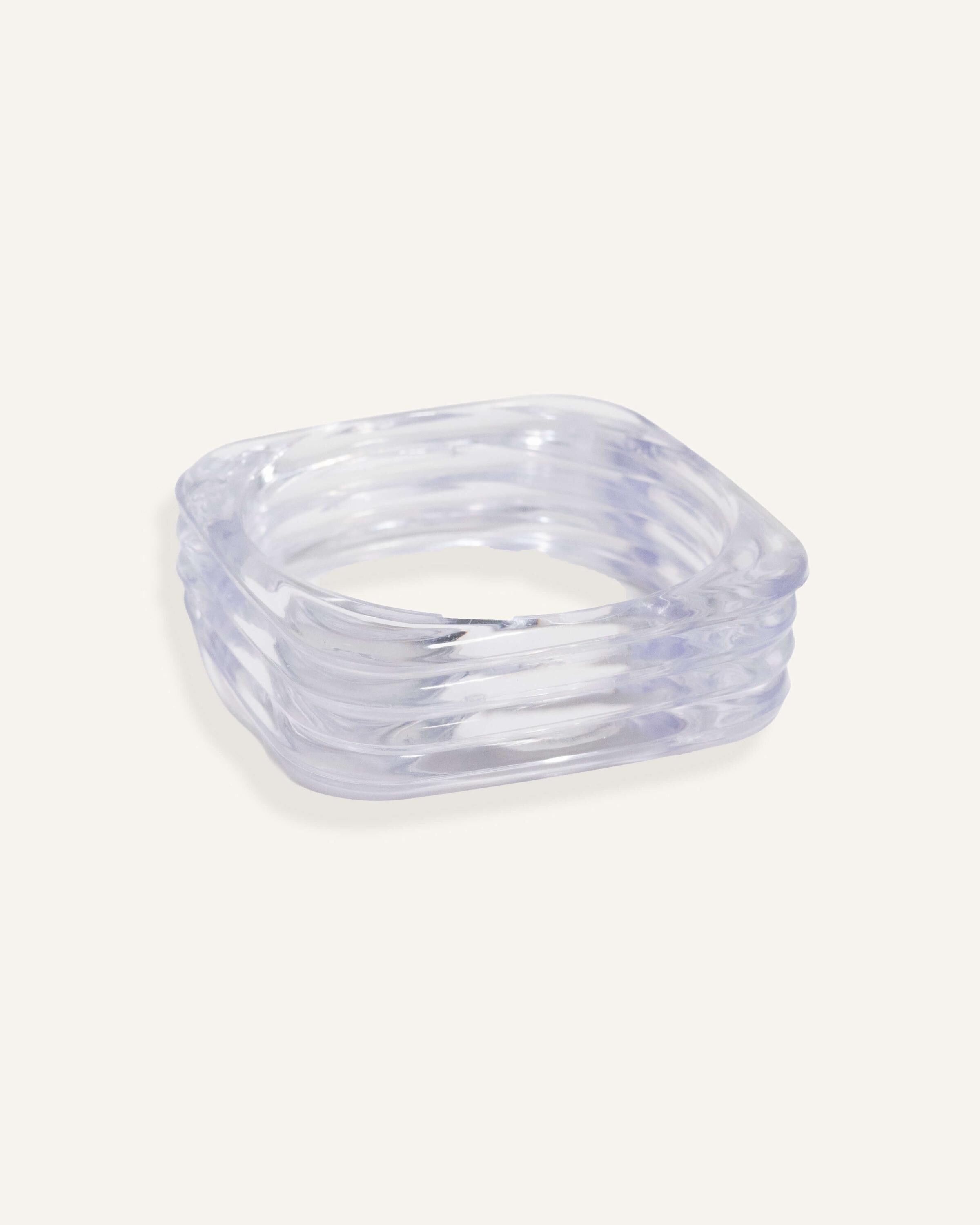 Clear resin square bracelet with curved edges, shown stacked and solo