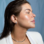 Gold box chain choker necklace worn on neck, available in silver too.