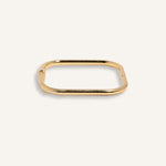 Gold-plated square edge bracelet with sleek finish, shown flat on neutral background.