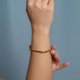 Gold square bangle bracelet with open hinge, minimalist geometric cuff for women’s modern and stackable jewelry looks