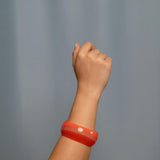 Chunky coral pink ombre acrylic bangle bracelet with glossy finish, retro-inspired summer jewelry accessory for women