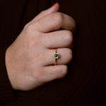 Dainty green zirconia ring with sparkling light green stones on elegant band, versatile Loon Concept jewelry