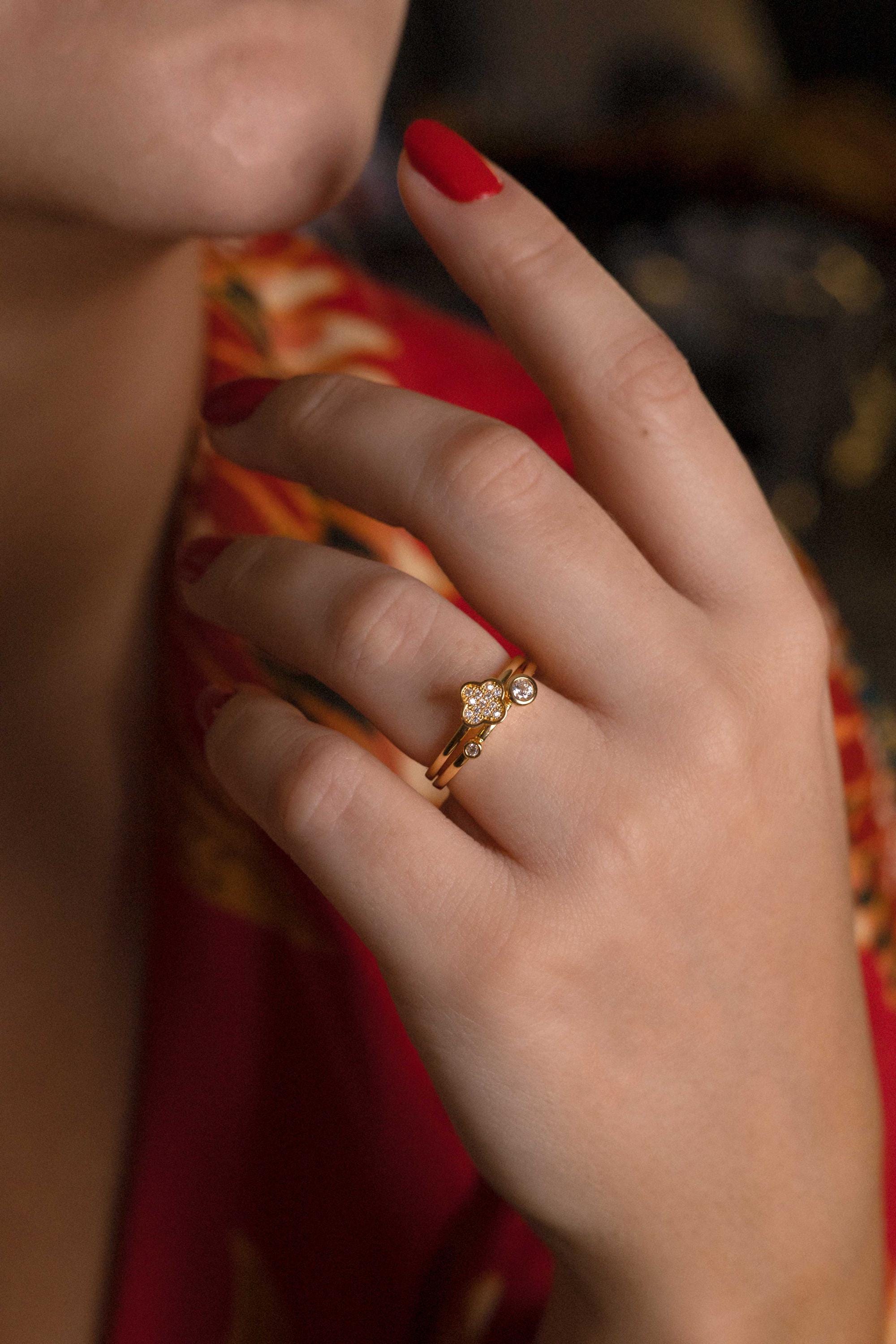 London ring with adjustable rings jewelry and dainty diamond ring, a timeless and chic accessory.