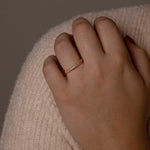 A set of chunky silver rings in rhodium, gold, and rose-plated designs