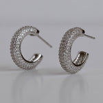Amelia earrings with gold hoop earring set and small dangle earrings, a timeless and chic accessory.