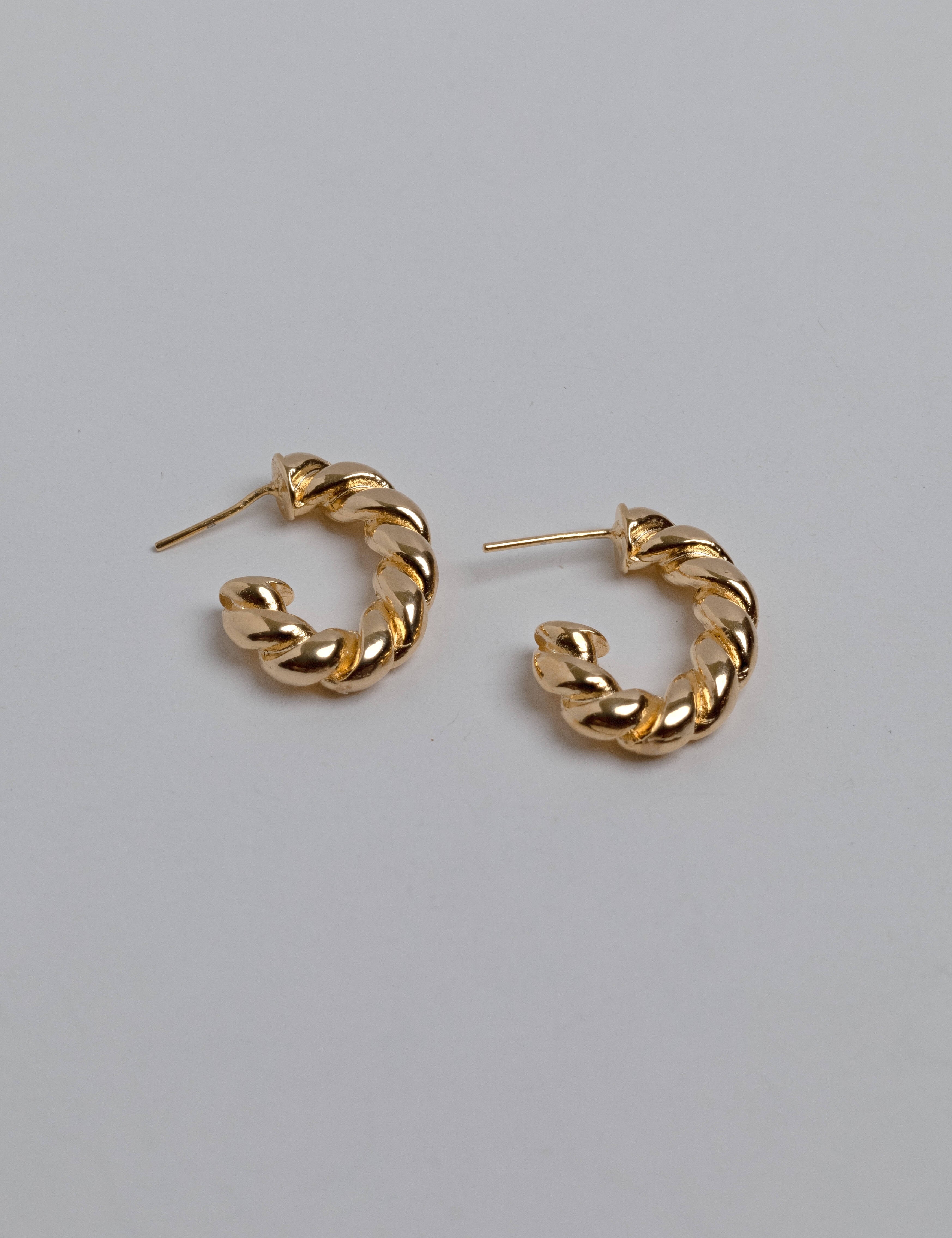 Addison earrings with gold hoop earring set and small dangle earrings, a timeless and chic accessory.