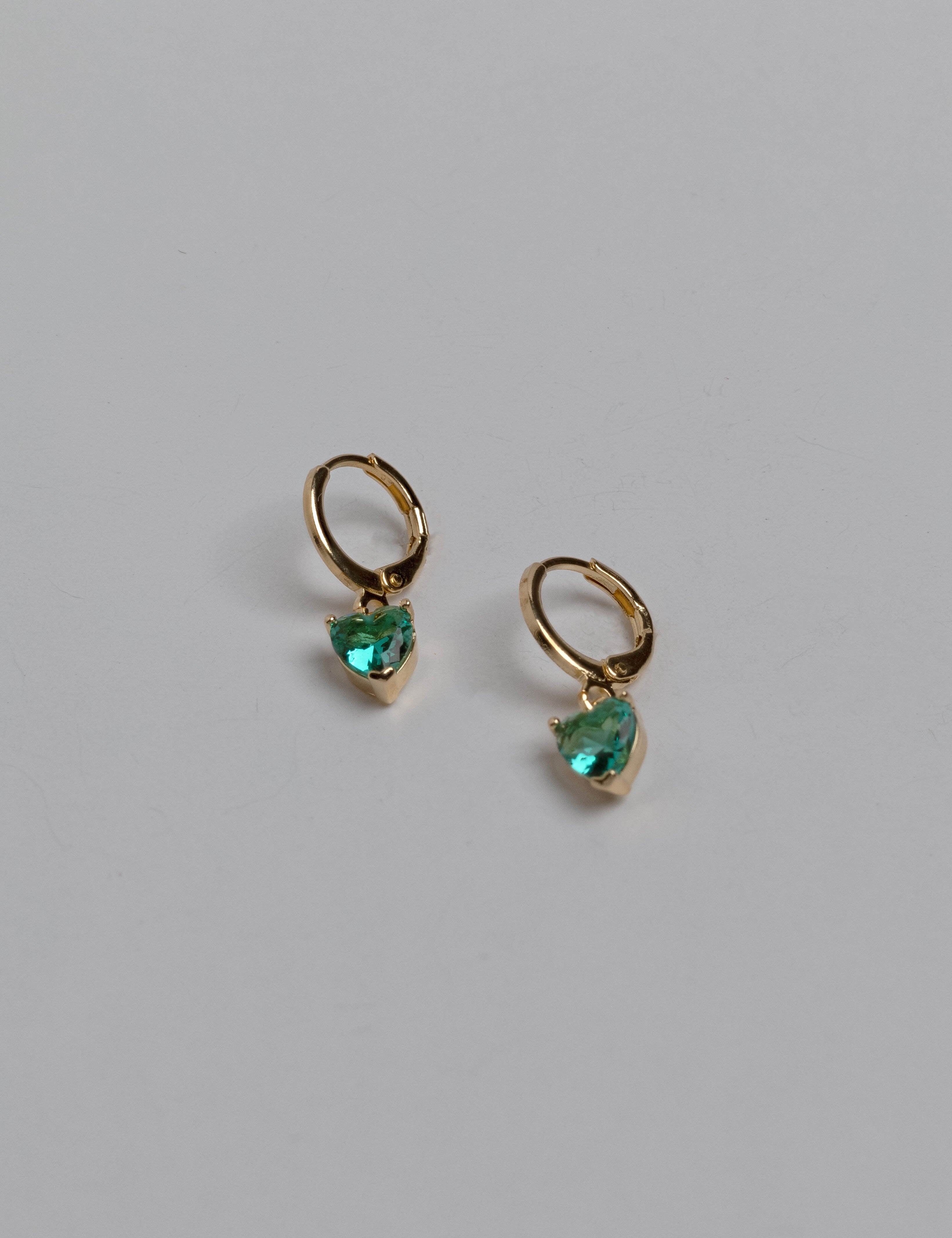 Natalie earrings with gold hoop earring set and small dangle earrings, a timeless and chic accessory.