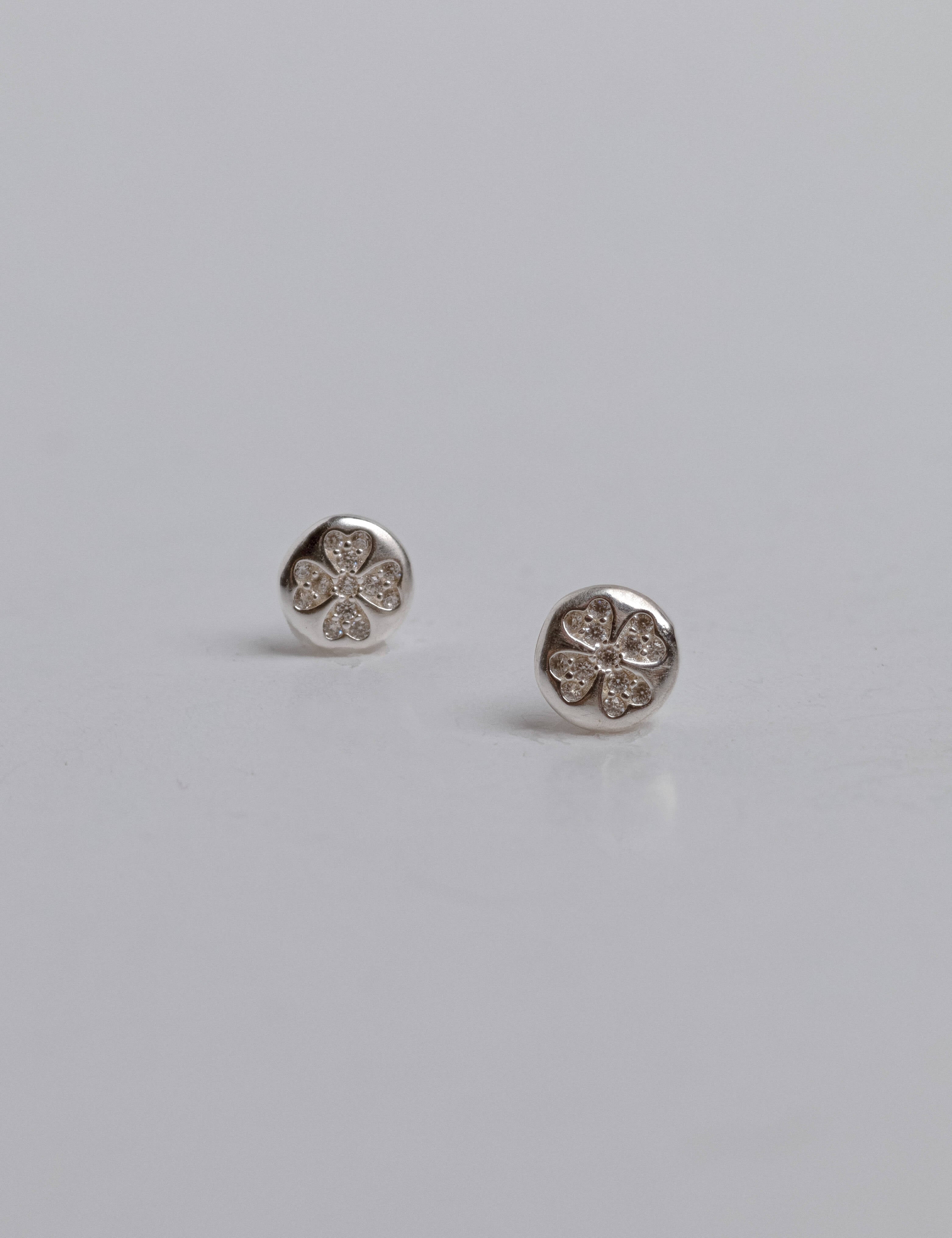 Rafaella earrings with gold hoop earring set and small dangle earrings, a timeless and chic accessory.