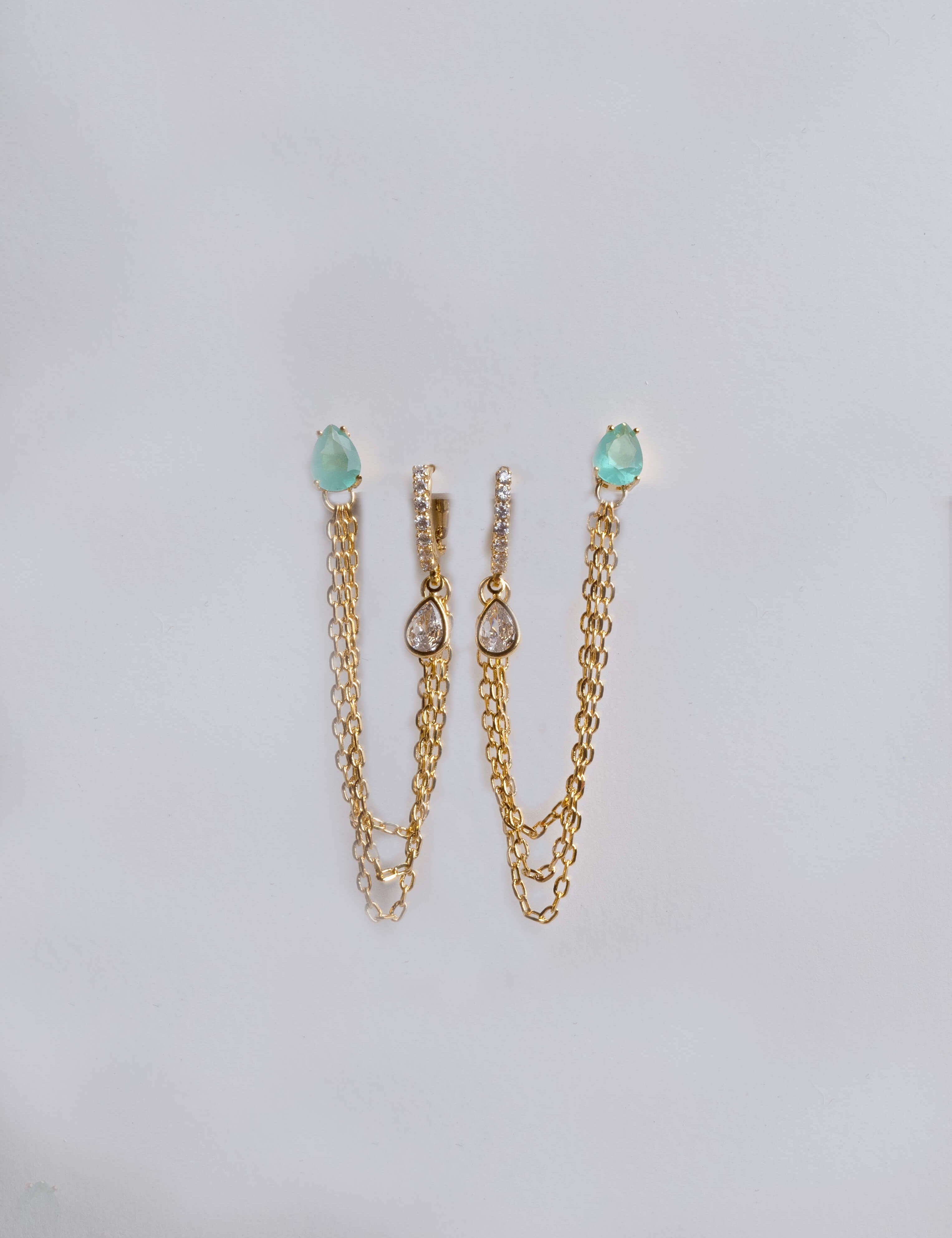 Samantha earrings with gold hoop earring set and small dangle earrings, a timeless and chic accessory.