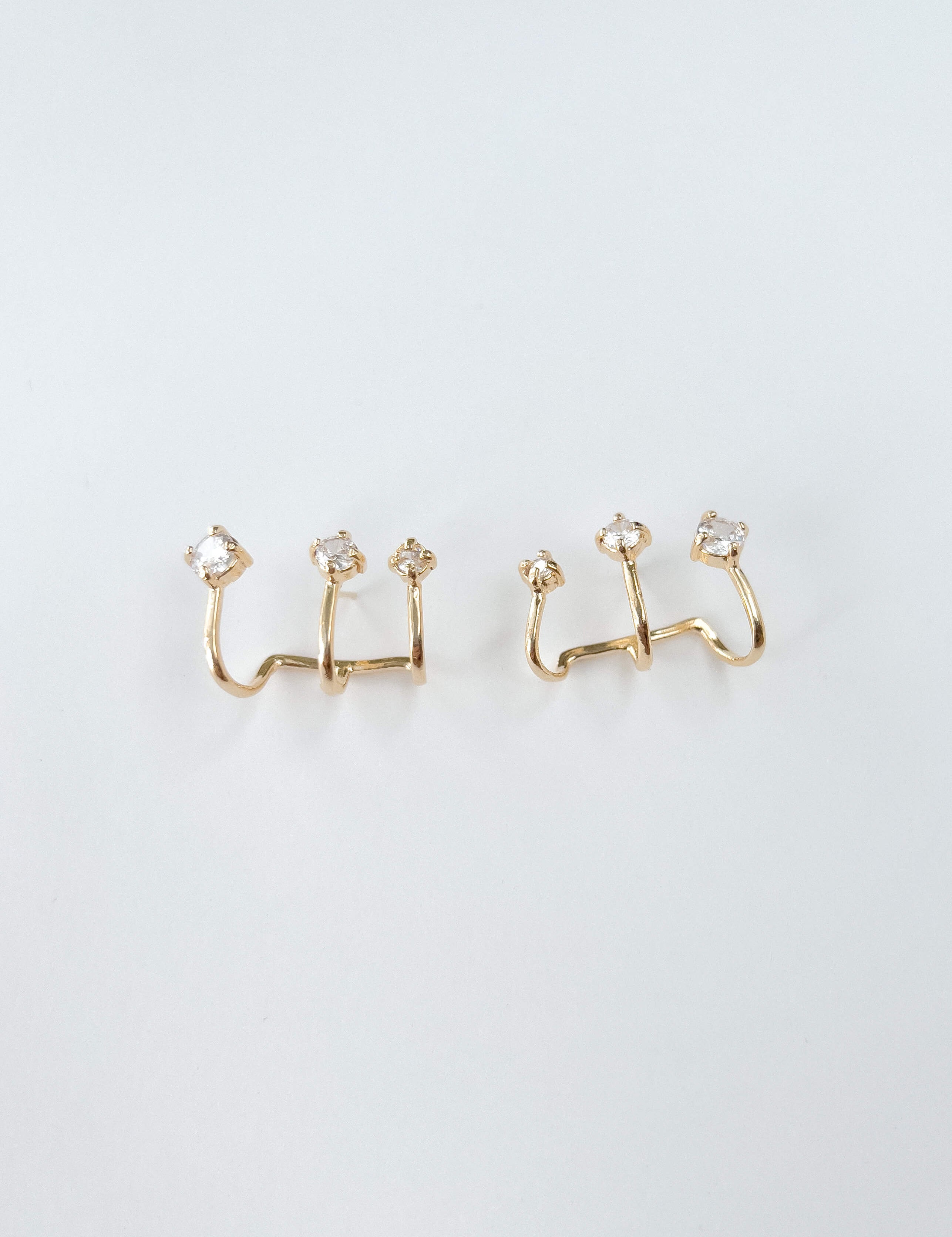 Scarlet earrings with gold hoop earring set and small dangle earrings, a timeless and chic accessory.