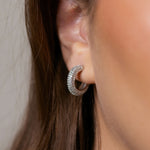 Amelia earrings with gold hoop earring set and small dangle earrings, a timeless and chic accessory.