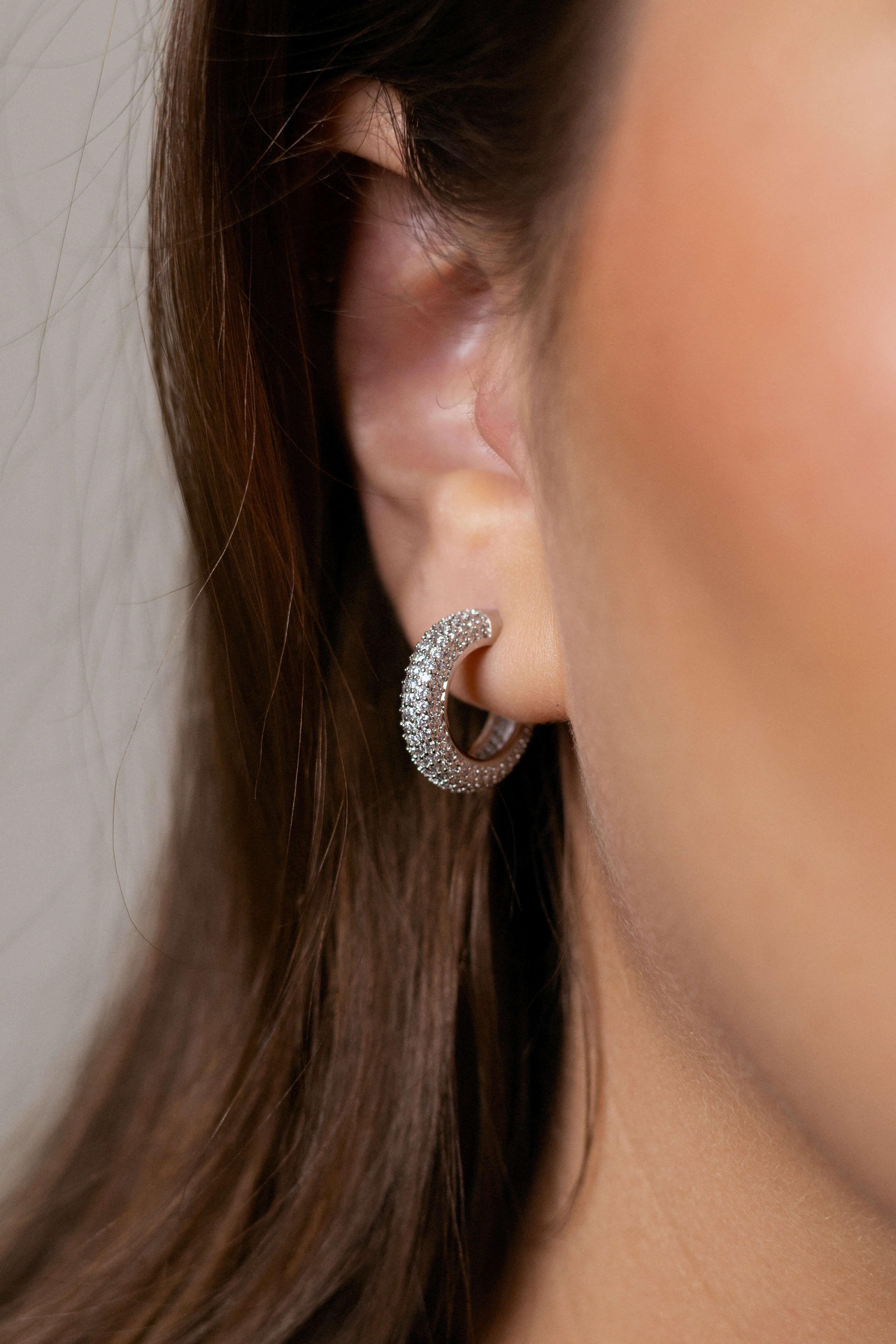 Amelia earrings with gold hoop earring set and small dangle earrings, a timeless and chic accessory.