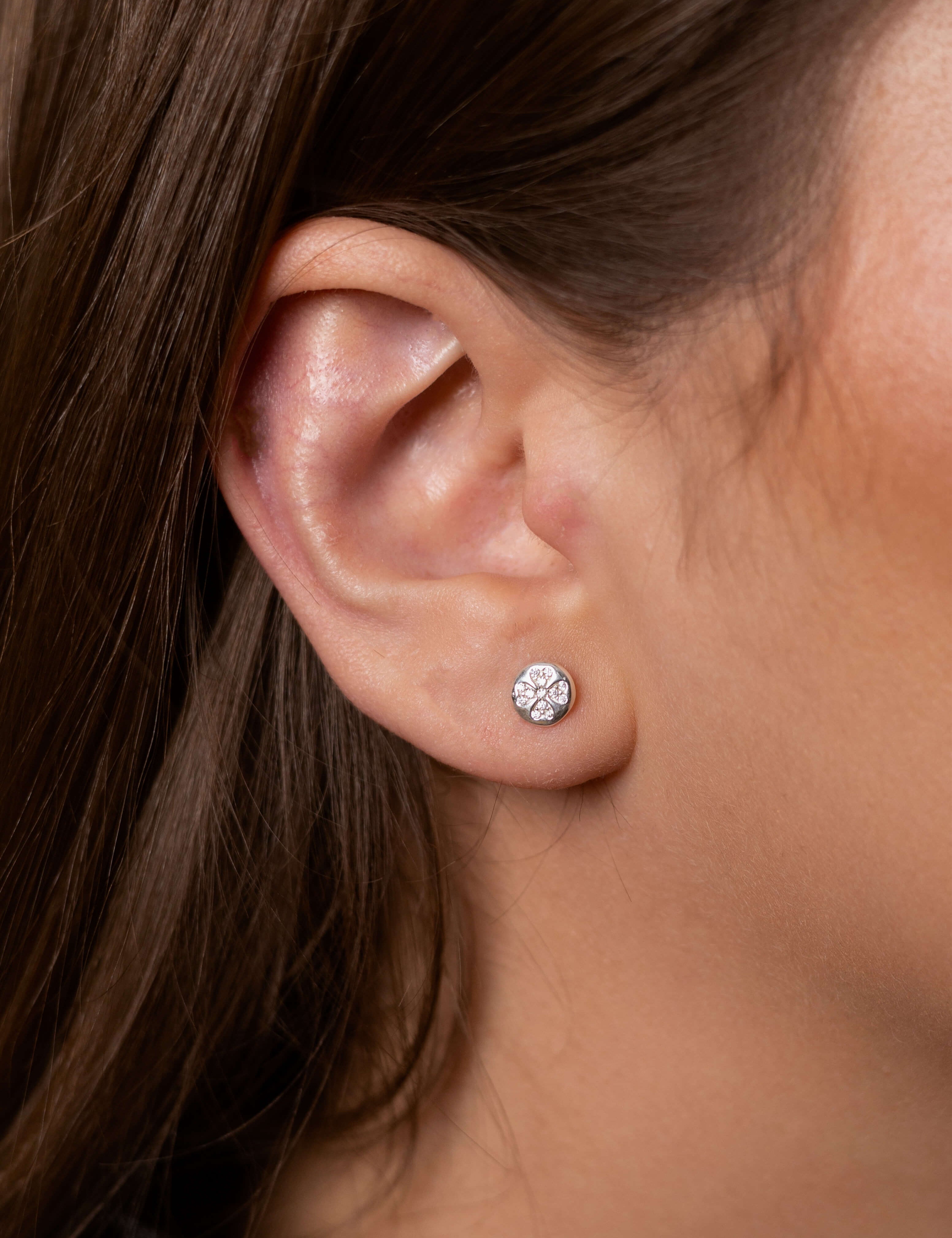 Rafaella earrings with gold hoop earring set and small dangle earrings, a timeless and chic accessory.