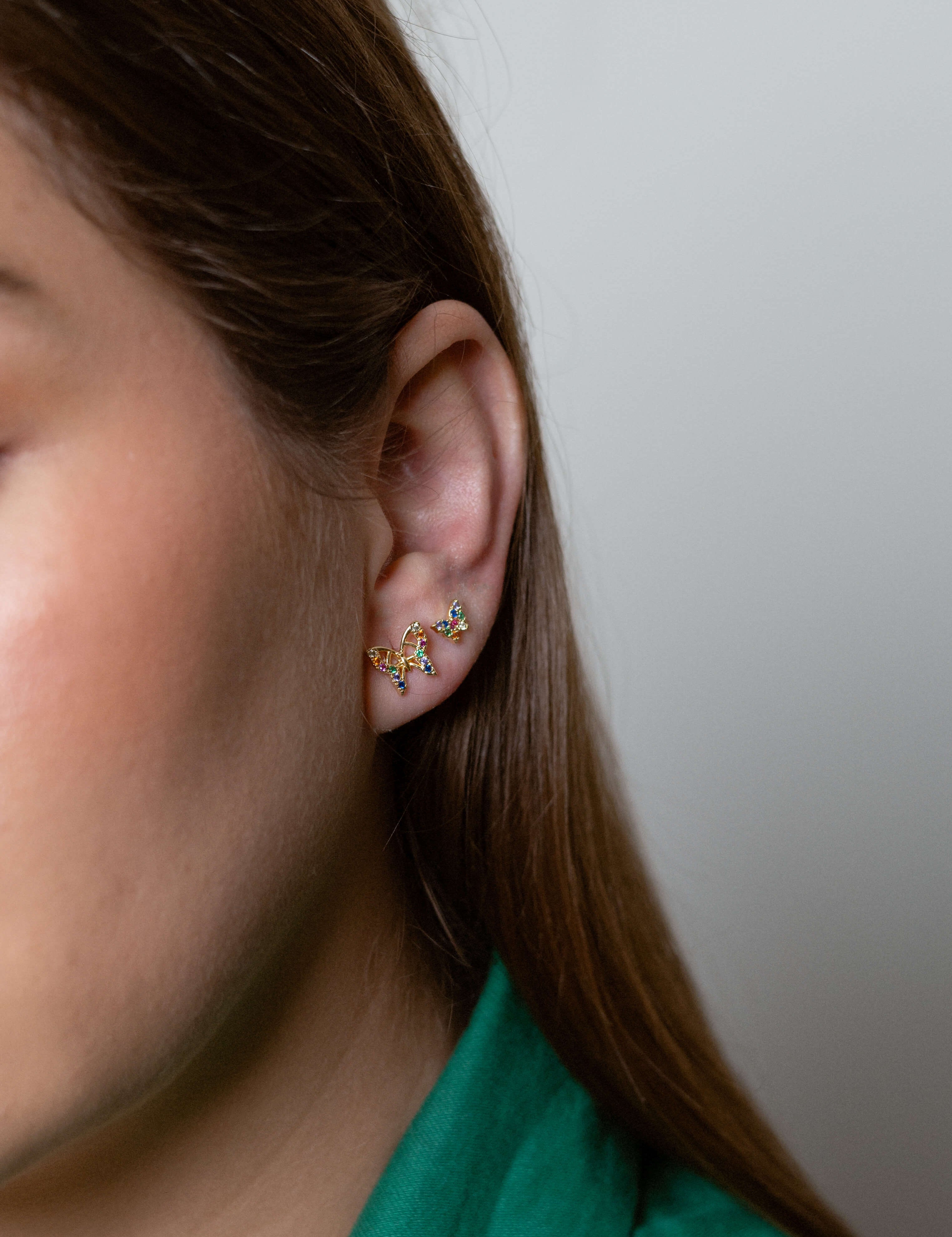 Madison earrings with gold hoop earring set and small dangle earrings, a timeless and chic accessory.
