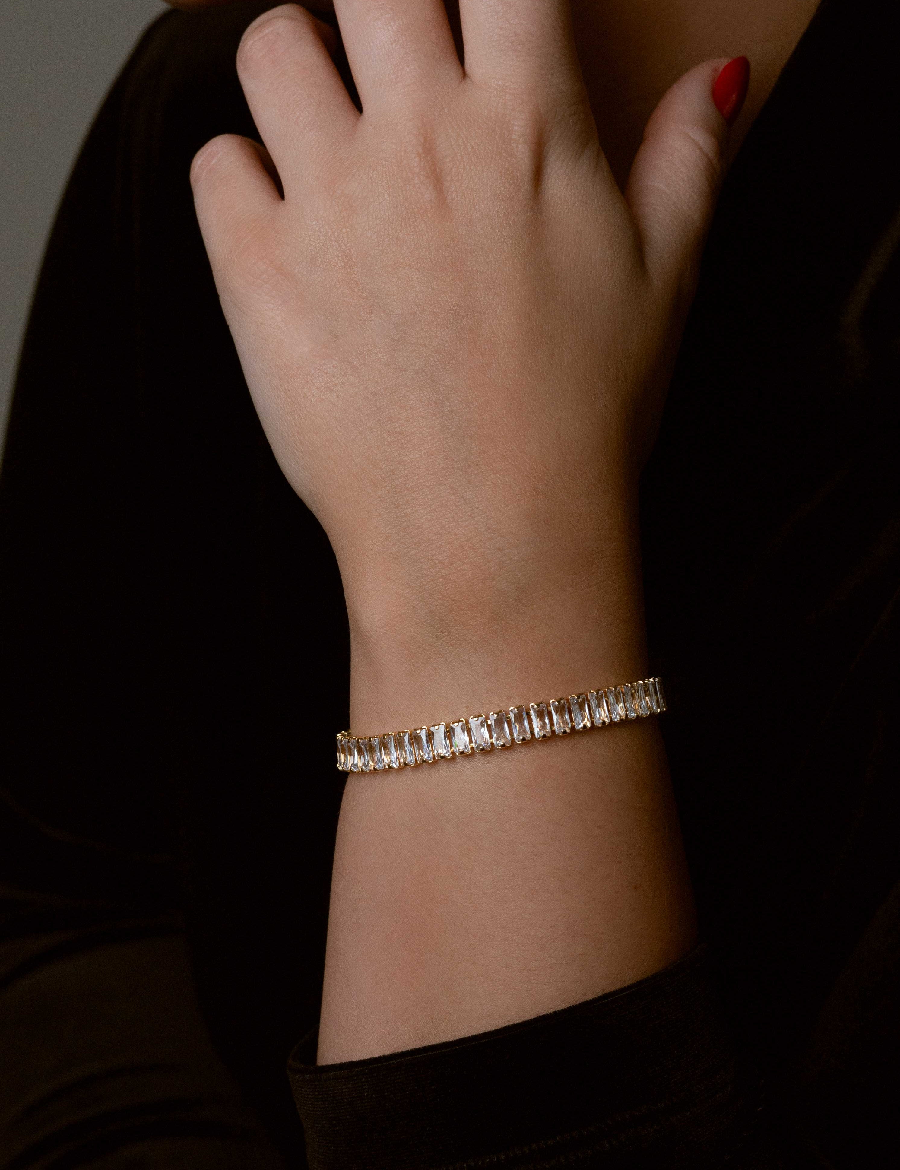 Gold-dipped ladies tennis bracelet with cubic zirconia stones, designed for a sleek and polished look
