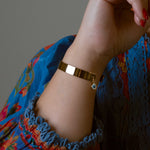 Gold-dipped evil eye bracelet with a protective design, crafted for everyday wear.