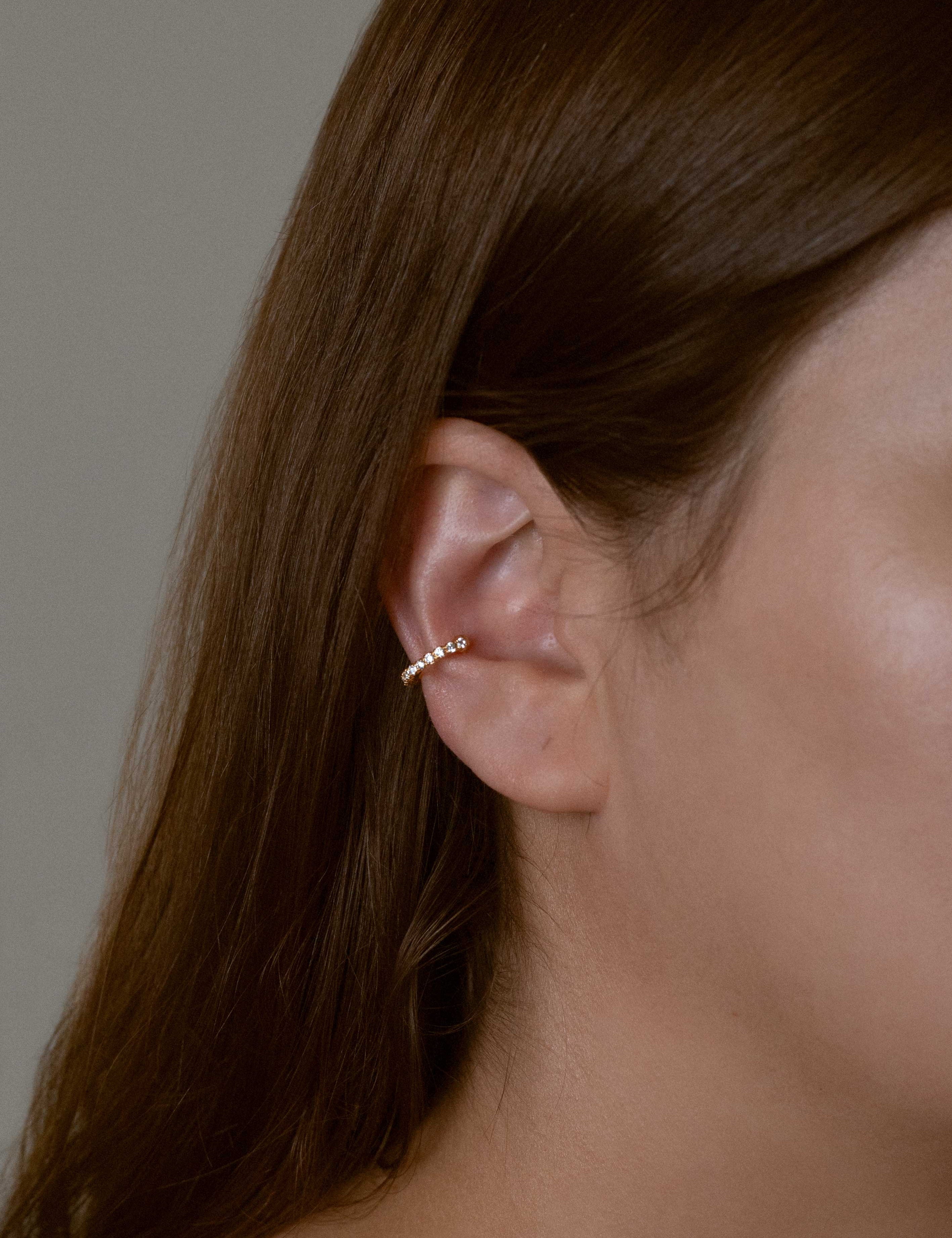 Sienna earrings with gold hoop earring set and small dangle earrings, a timeless and chic accessory.