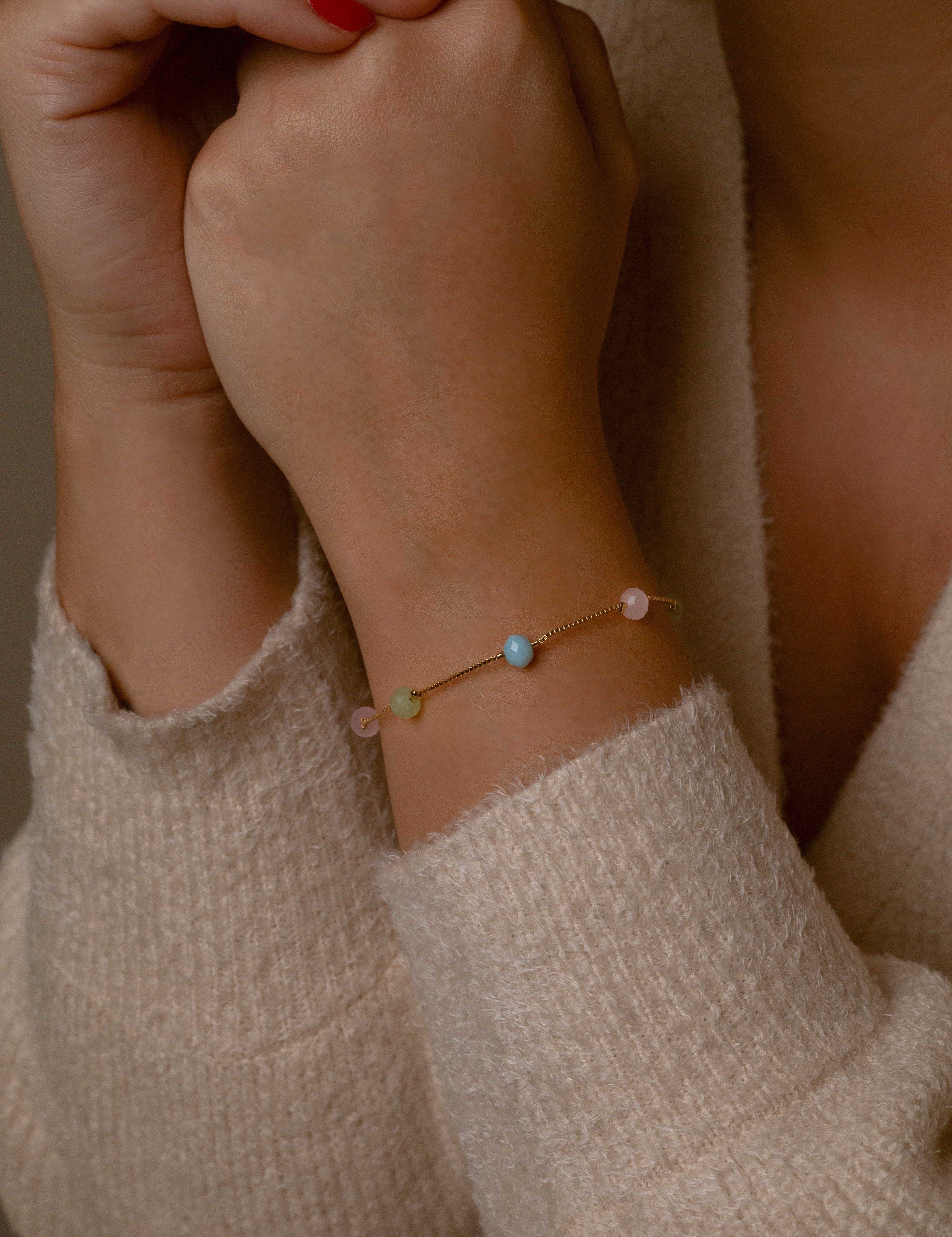 Gold bead bracelet with colorful gemstones, crafted with a gold-dipped finish for a vibrant look.