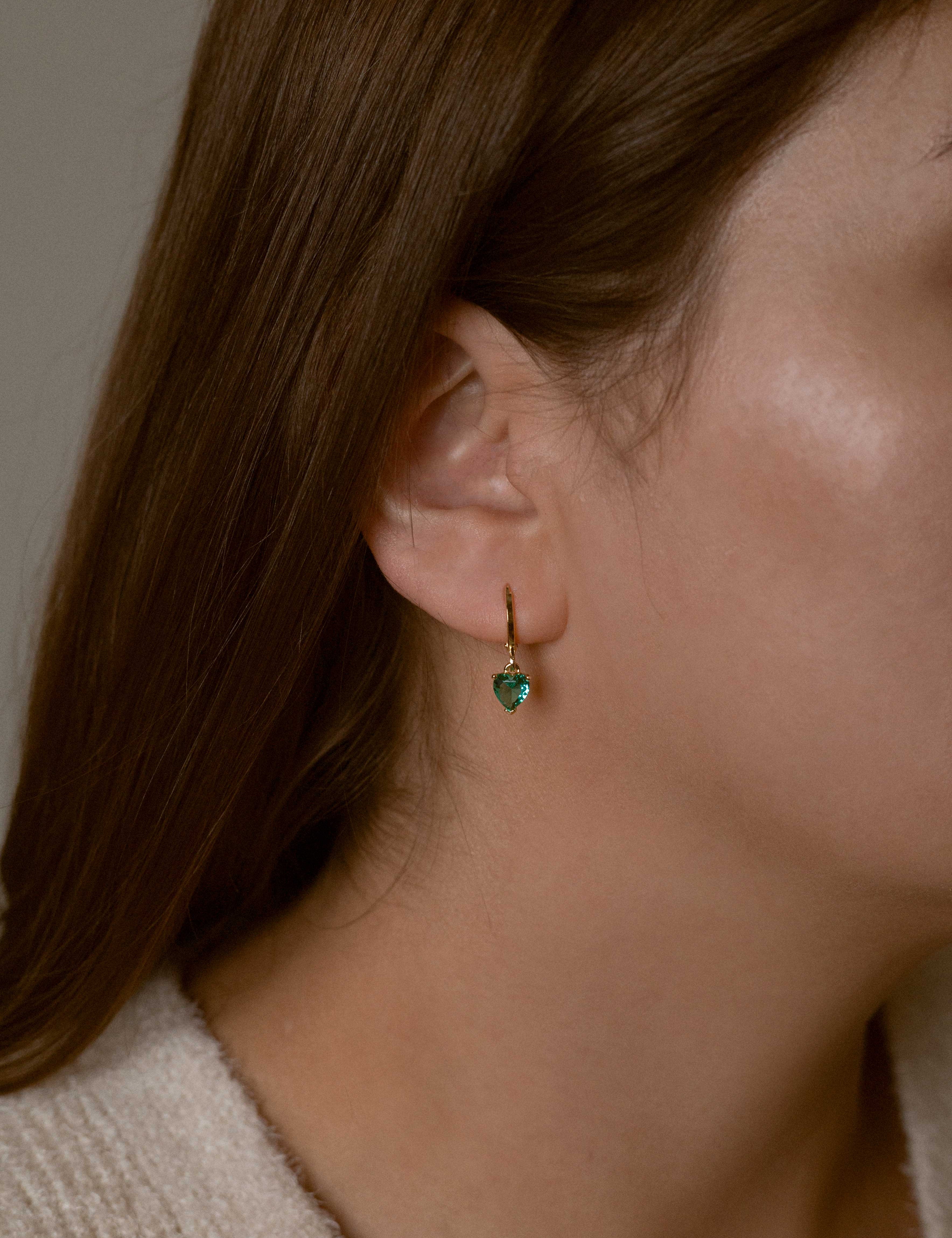 Natalie earrings with gold hoop earring set and small dangle earrings, a timeless and chic accessory.