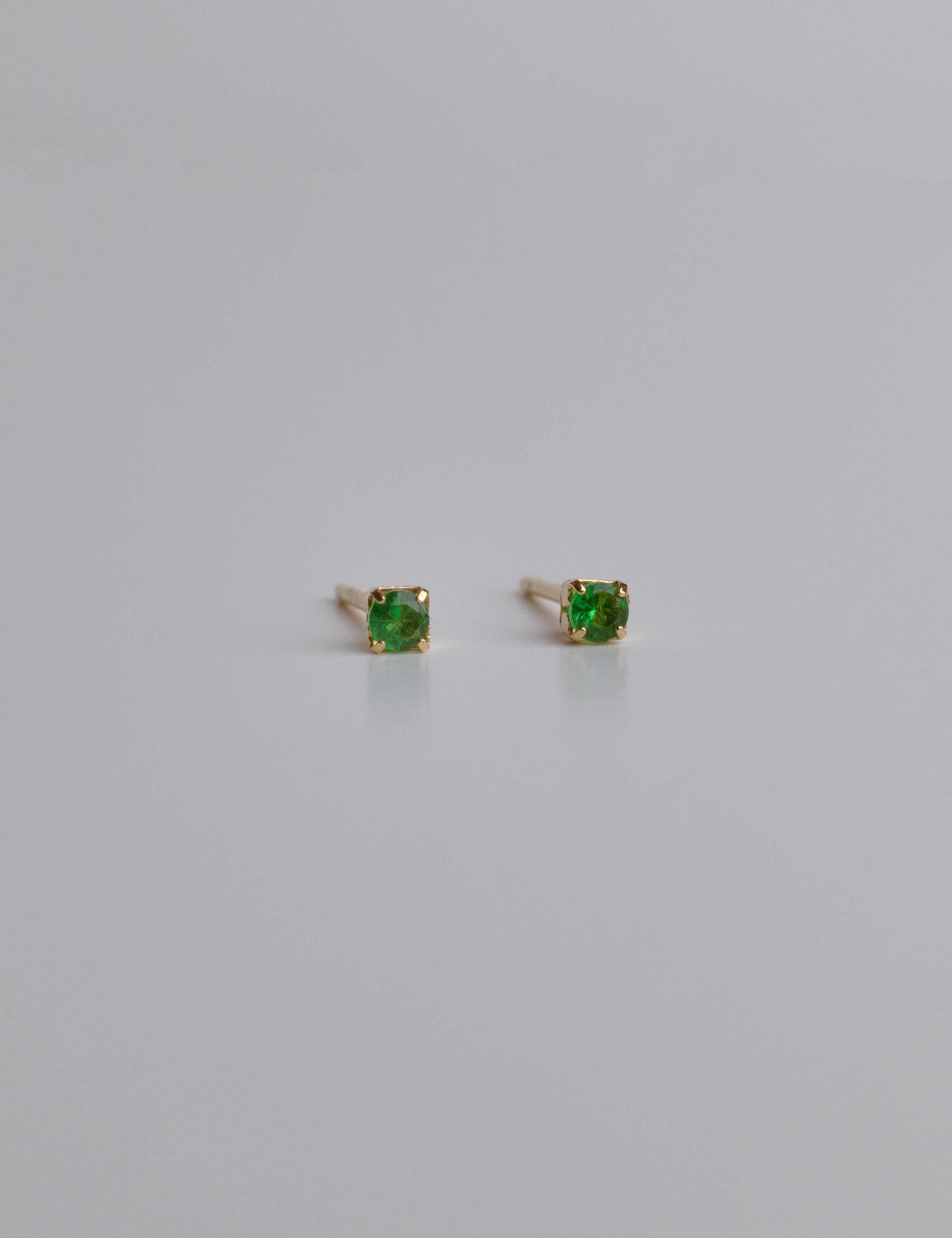 Georgia earrings with gold hoop earring set and small dangle earrings, a timeless and chic accessory.