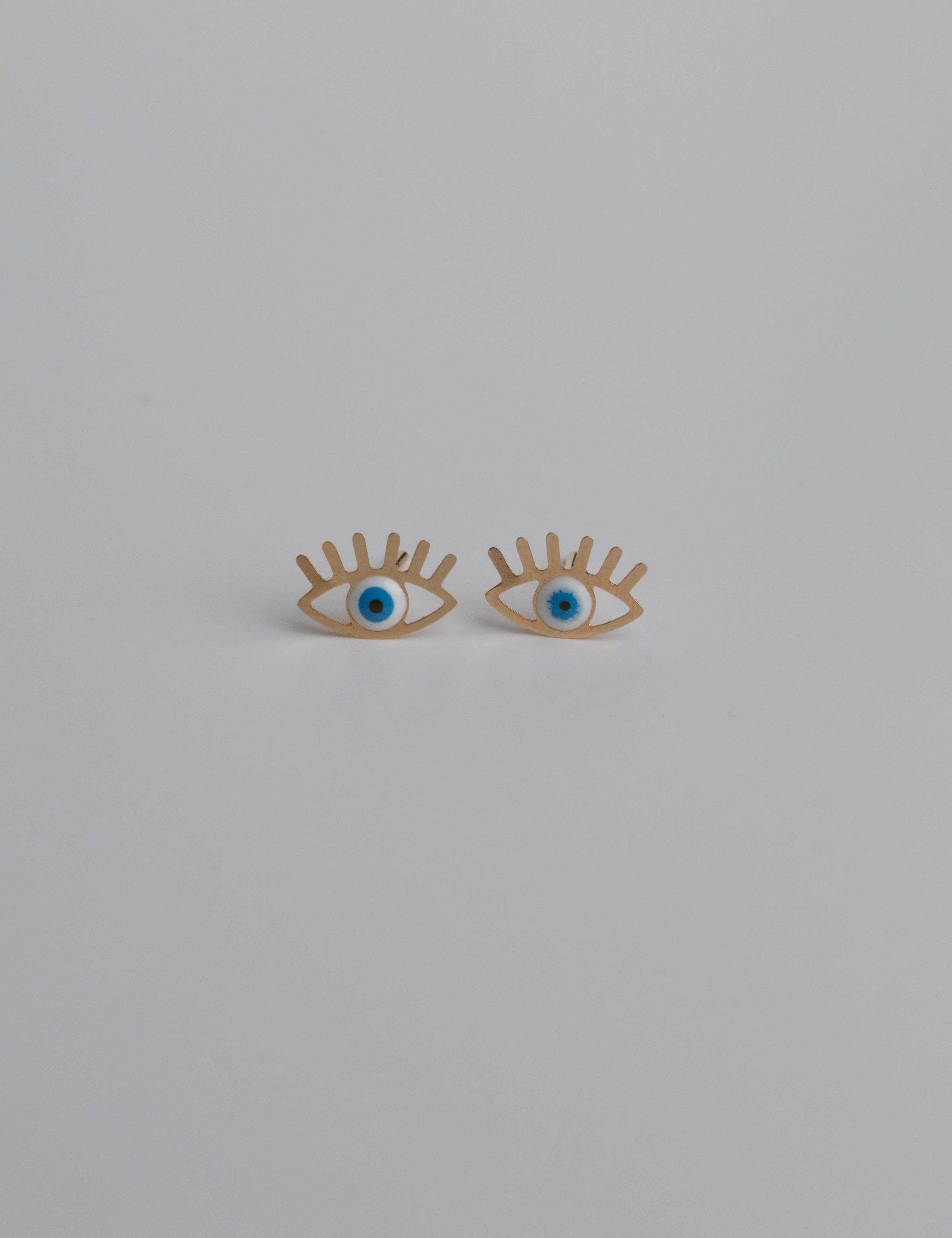 Jasmine earrings with gold hoop earring set and small dangle earrings, a timeless and chic accessory.