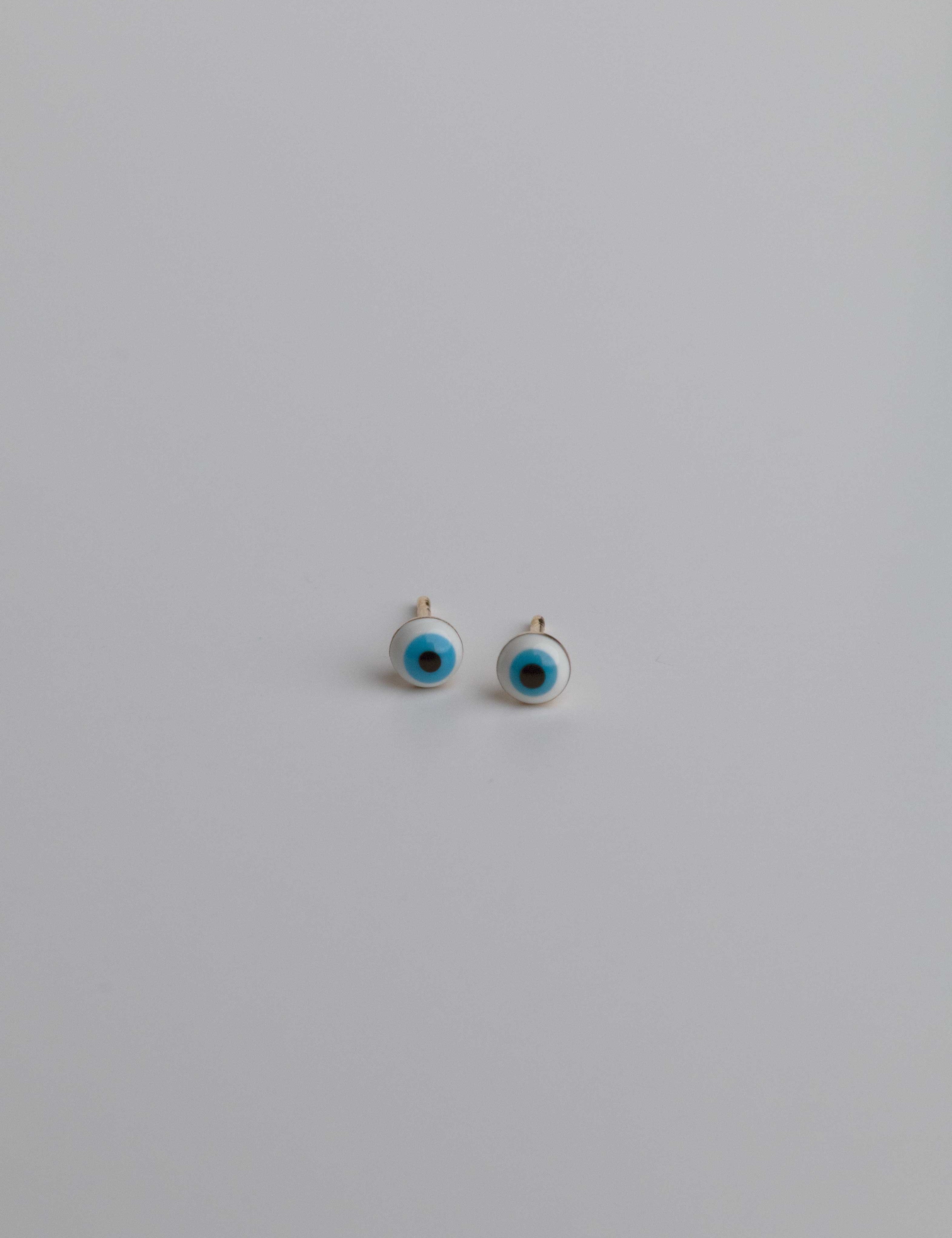 Jasmine earrings with gold hoop earring set and small dangle earrings, a timeless and chic accessory.