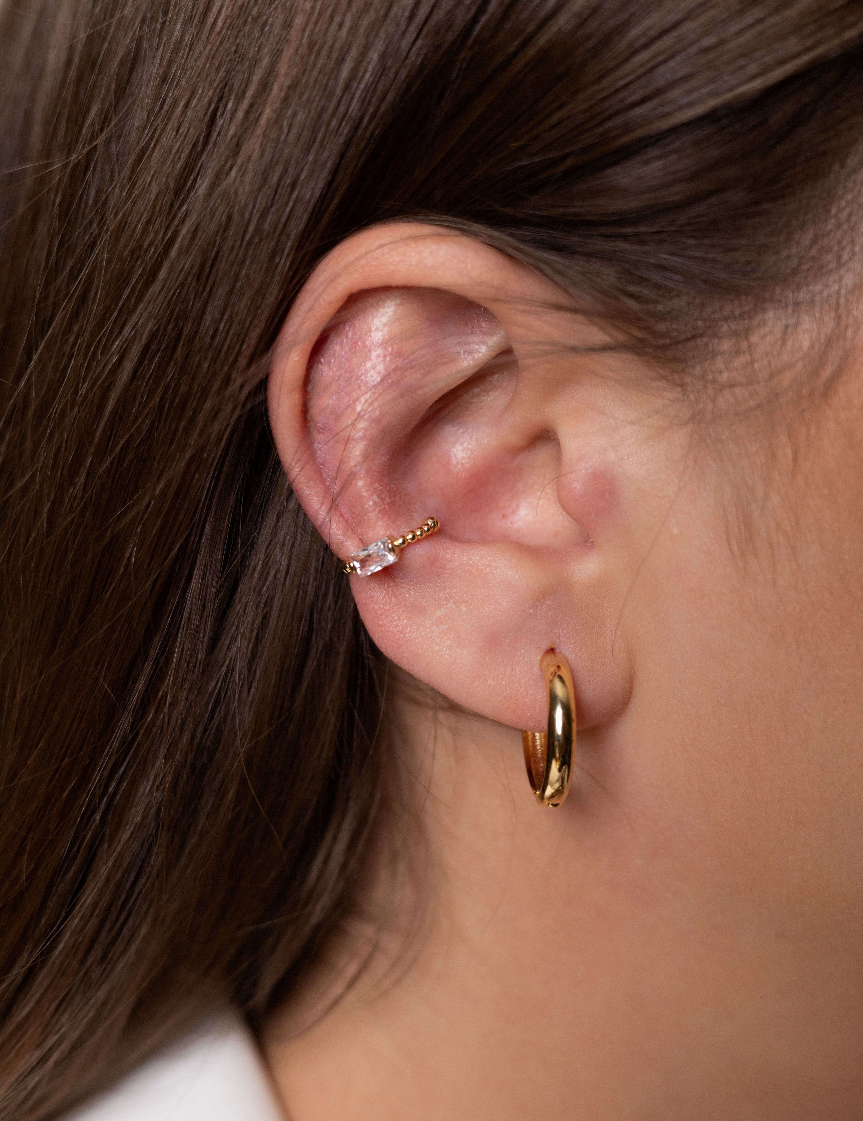 Jenna earrings with gold hoop earring set and small dangle earrings, a timeless and chic accessory.