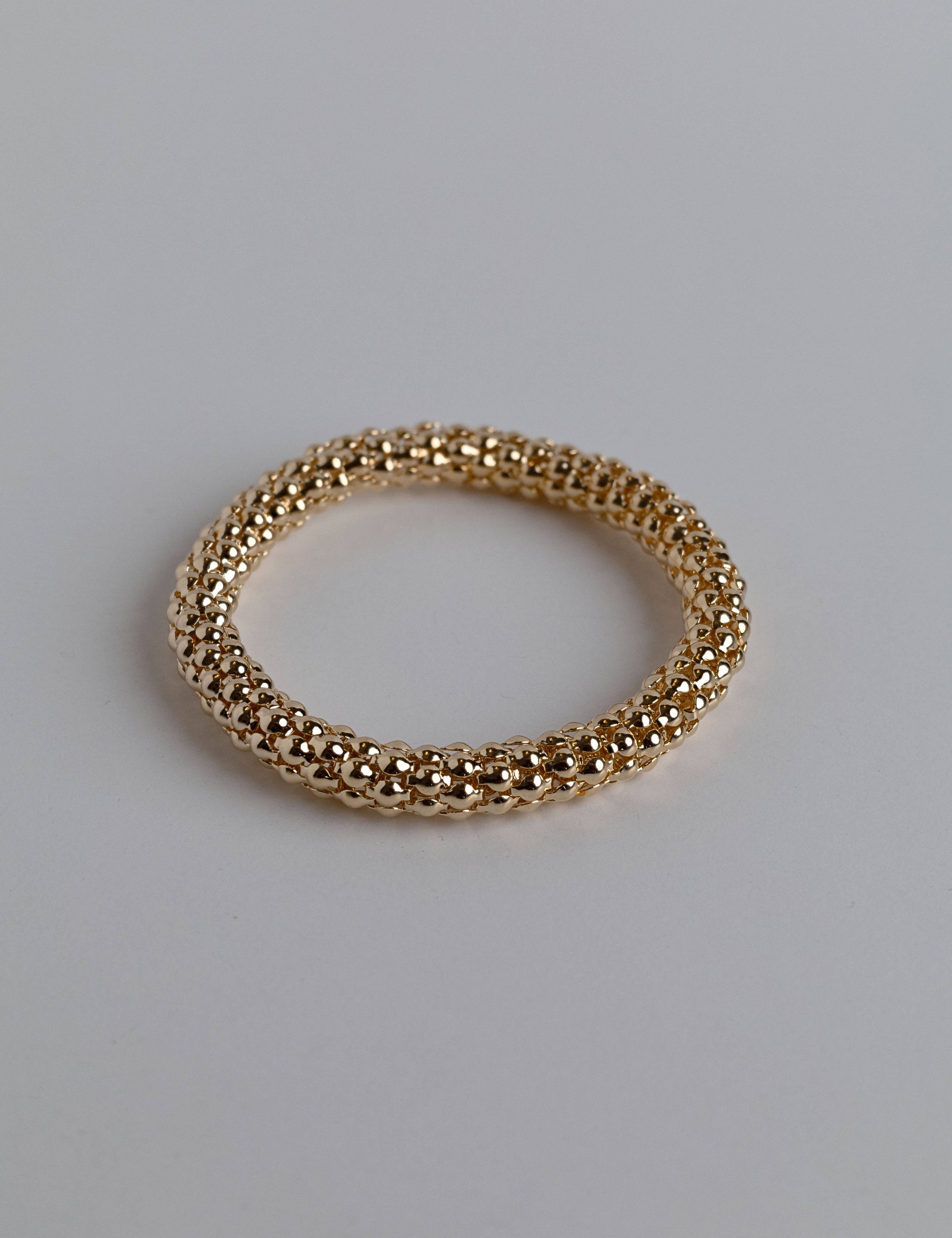 Dainty gold bracelet with a delicate ball landscape design, gold-dipped for a timeless and elegant look