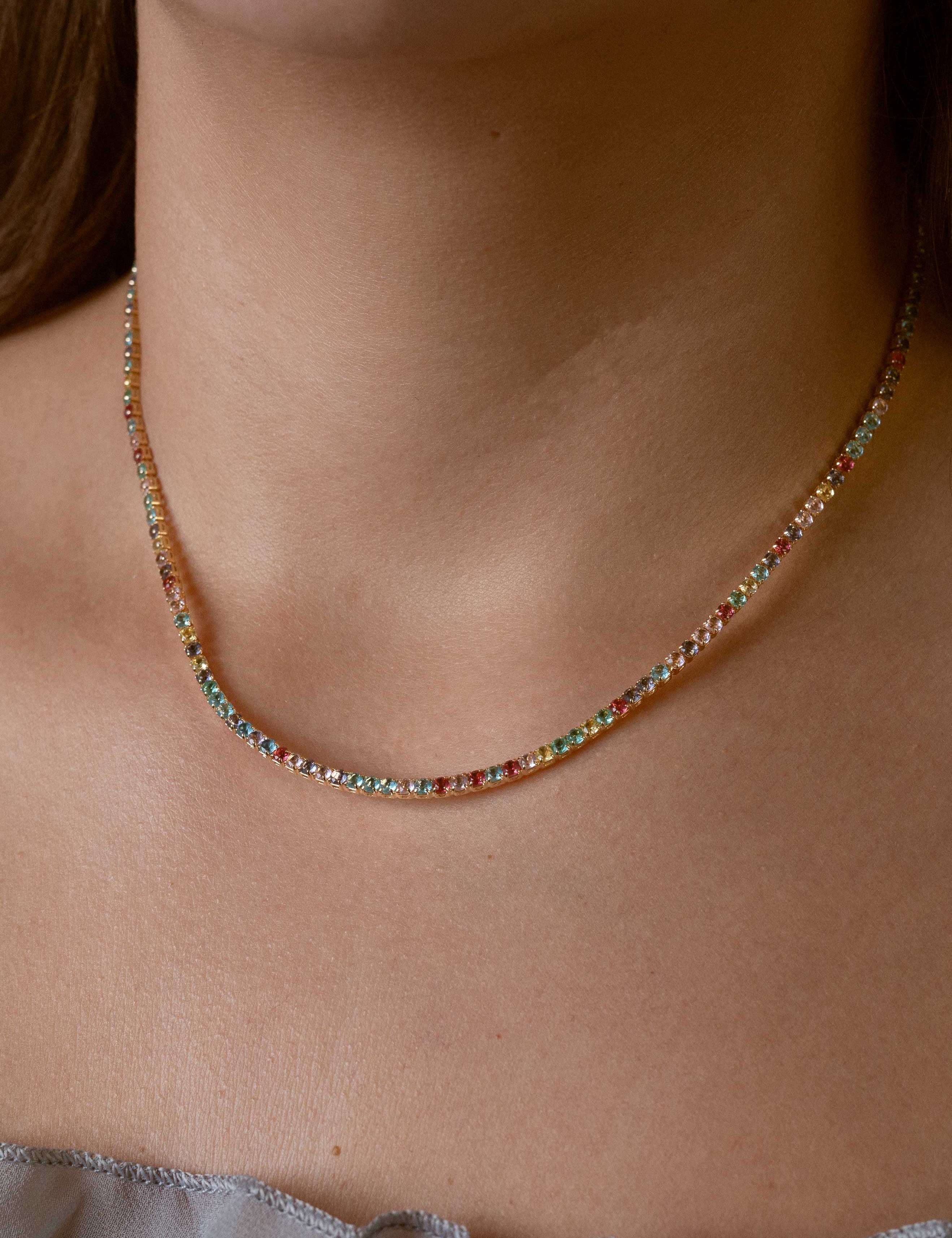 Moissanite tennis necklace with 18K gold plating, featuring dazzling gemstones in a classic design
